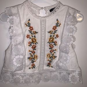 Floral crop top with designs